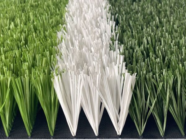 Artificial grass on the football field